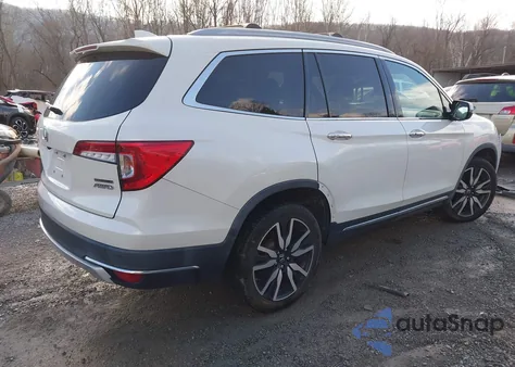 2019 Honda Pilot Touring z USA, uszkodzony, nr VIN 5FNYF6H98KB066114